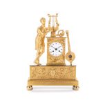 A FRENCH EMPIRE ORMOLU MANTEL CLOCK, 19TH CENTURY the 8,5cm white enamelled circular dial