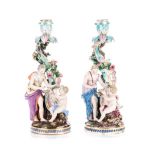 A PAIR OF FIGURAL MEISSEN CANDLESTICKS, LATE 19TH CENTURY each modelled as a maiden draped in