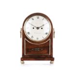 A REGENCY MAHOGANY AND BRASS INLAID MANTEL CLOCK, 19TH CENTURY the 17cm white enamelled circular