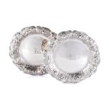 A PAIR OF GEORGE IV SILVER DISHES, EDWARD FARREL, LONDON, 1824 of shaped circular shallow form,