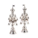 A PAIR OF AUSTRIAN SILVER TORAH FINIALS, MAKER'S MARK F.T., 1921 of circular openwork crown form,