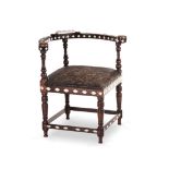 A TEAK AND IVORY INLAID CORNER CHAIR, 19TH CENTURY the curved toprail surmounted by a shaped ivory
