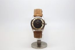Vintage Universal Geneve Polerouter Super Automatic, black and silvered two tone dial with baton