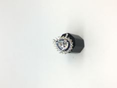 Sapphire and diamond dress ring, central rose pear cut diamond weighing an estimated 1.10ct, with