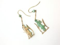 Pair of carved jade figure earrings, green jadeite carved as ladies with gold rush and bamboo