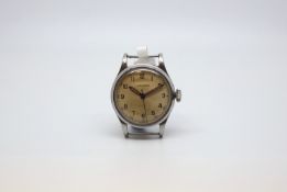 Gentlemen's stainless steel military Longines watch, circa 1940s, tan coloured dial, Arabic numbers,