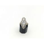 Old cut diamond dress ring, central old cut diamond weighing an estimated 1.75ct, with an old cut
