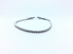Diamond tennis bracelet, round brilliant cut diamonds weighing an estimated total of 3.02ct, four