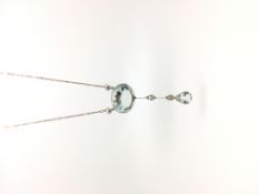 Aquamarine and diamond drop pendant, oval cut aquamarine weighing an estimated 17.00ct+ suspended