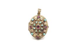 Austro Hungarian gem set locket, set with foil backed garnets, turquoise and enamel, central