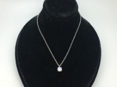 Tiffany & Co single stone diamond pendant, round brilliant cut diamond weighing an estimated 0.45ct,