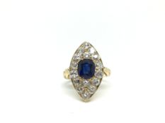 Sapphire and diamond marquise shaped panel ring, central cushion cut sapphire, with certificate