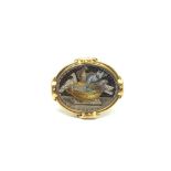 19th Century micro mosaic brooch depicting 'Capitoline Doves' set within a yellow gold border with