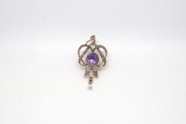 Art nouveau amethyst and seed pearl pendant, 8mm round central amethyst, seed pearl set frame, pearl