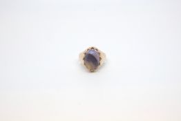 Dark opal signet ring, large 15.4 x 11.4 cabochon opal mounted in a carved claw setting, mounted