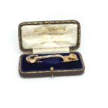 Victorian gold miners brooch, engraved shovel set with gold in agate, stone set horseshoe to handle,