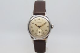 Vintage Longines special, circular dial with Arabic numerals, outer minuet track, stepped bezel,