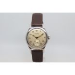 Vintage Longines special, circular dial with Arabic numerals, outer minuet track, stepped bezel,