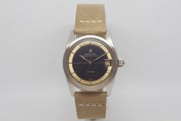 Vintage Universal Geneve Polerouter Super Automatic, black and silvered two tone dial with baton