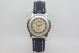 Vintage Atlantic Varldsmastarur , circular two tone cream and blue dial, red centre seconds, outer