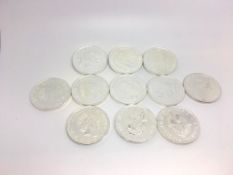 A quantity of 11 mostly 2016/17 Â£2 silver coins, weighing approximately 342g gross