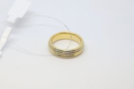 18ct yellow gold wedding band, textured design, gross weight approximately 11.4g, ring size P1/2