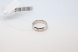 Diamond set wedding band, three round brilliant cut diamonds set in a 5mm 9ct white gold band,