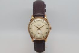 Gentlemen's Smiths Deluxe 9ct Gold watch, circa 1950s, silver two tone dial, gold dagger hands,