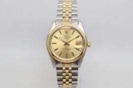 Rolex midsize Oyster Perpetual Date Just, champagne dial with only baton hour markers, polished gold