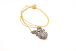 Rose cut diamond heart and bow necklace, bombe set rose cut diamonds suspended from a stone set bow,
