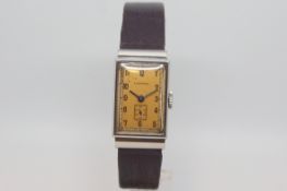 Vintage Longines dress watch, rectangular salmon dial with deco style Arabic numerals and subsidiary