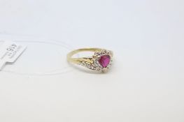Red stone and diamond cluster ring, in 9ct yellow gold, ring size P