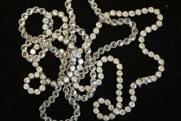 A pair of large CZ set silver chains