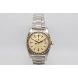 Vintage Rolex Oyster Perpetual 'Bubble Back', circular dial with dagger hour markers, gold outer