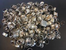 A quantity of mostly silver rings, weighing approximately 1790g gross