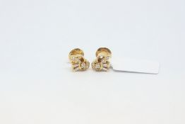 Diamond cluster earrings, set with baguette and round brilliant cut diamonds, set in yellow metal