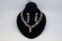 Moonstone, amethyst and pearl fringe necklace, set in silver, together with a pair of matching