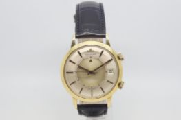 Jaeger-LeCoultre 18ct Memovox, circular twi tone dial with onyx baton hour markers, date aperture,