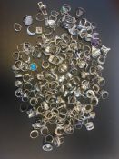A quantity of mostly gem set silver rings, weighing approximately 1336g gross