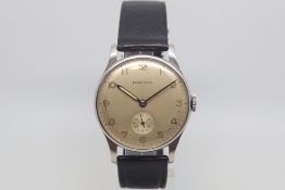 Vintage oversized Longines, circular silvered dial with Arabic numerals, subsidiary seconds dial,