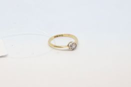 Single stone diamond ring, old cut diamond weighing an estimated 0.12ct, set in 18ct yellow gold,