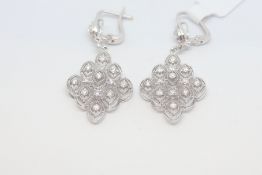 Diamond drop earrings, round brilliant cut diamonds, set in a diamond shaped design, estimated total