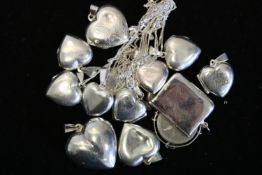 A quantity of mostly silver lockets, weighing approximately 72g gross
