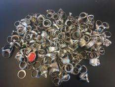 A quantity of mostly gem set silver rings, weighing approximately 1014g gross