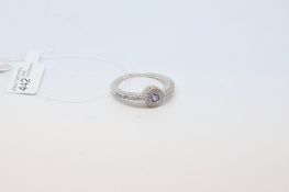 Tanzanite and diamond cluster ring, in 18ct white gold, ring size N