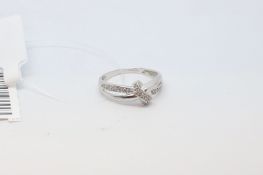 Diamond set knot ring, in 9ct white gold, ring size N
