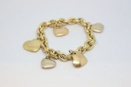 Pomellato 18ct charm bracelet, heavy gold link bracelet, five graduated heart charms in rose,