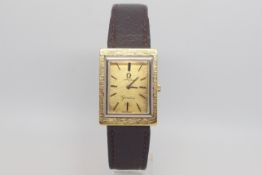 Omega Geneve two tone wrist watch, rectangular textured dial with baton hour markers, polished white