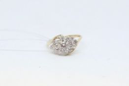 Cubic zirconia cluster ring, set in 9ct white gold, ring size M