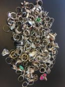 A quantity of mostly gem set silver rings, weighing approximately 1122g gross